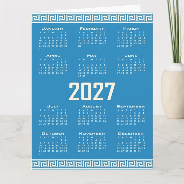 Tarjeta Calendario 2027, Greca, Cosmic Latte sobre Azul (Anverso)