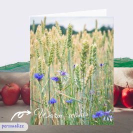 Tarjeta Campo de trigo con flores azules