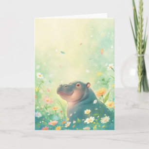 Tarjeta Campos de flores y hipopótamo feliz
