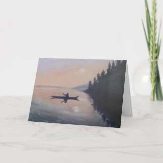 Tarjeta Canoa en un lago pacífico