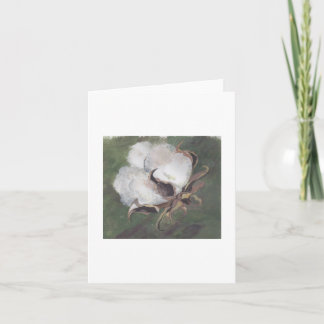 Tarjeta cápsula del algodón con el fondo verde