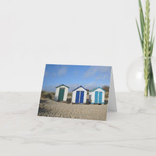 Tarjeta Casas de playa y cielos azules. Fotografía de play