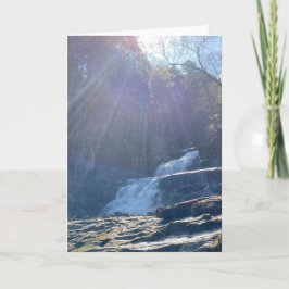 Tarjeta Cascada, rocas y rayos de sol