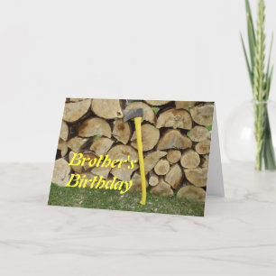 Tarjeta Cera amarilla de cumpleaños y pila de madera