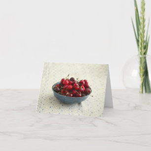 Tarjeta Cerezas en un tazón azul