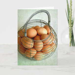 Tarjeta Cesta llena de huevos marrones