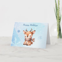 Ciervo de dibujos animados lindo en la nieve