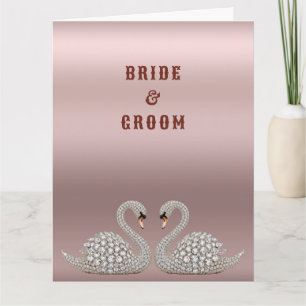 Tarjeta Cisnes de boda enjoyados creando un corazón sobre