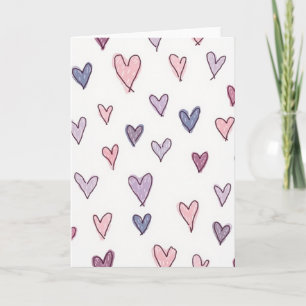 Tarjeta con patrón de corazones doodle