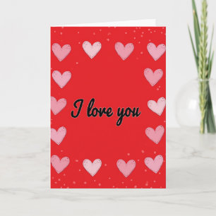Tarjeta con patrón de corazones rojos 'Te amo'