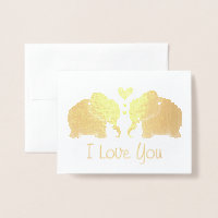 Elefante dorado par con corazones que te amo