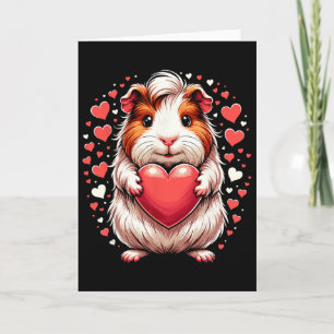 Tarjeta Conejillo de Indias sosteniendo corazón Día de San
