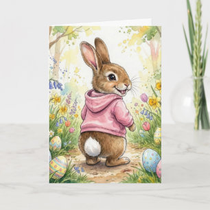 Tarjeta Conejo de Pascua en un jardín de primavera