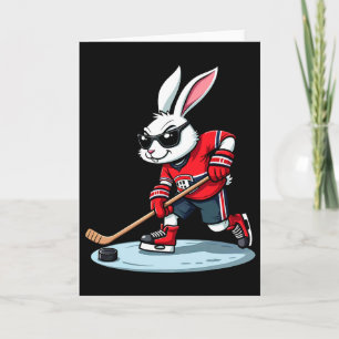 Tarjeta Conejo de Pascua jugando hockey 