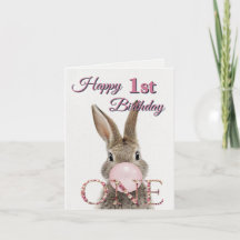 Conejo de primer cumpleaños soplando chicle rosa