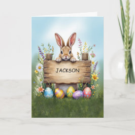 Tarjeta Conejo rústico de Rótulo en hierba con huevos de P