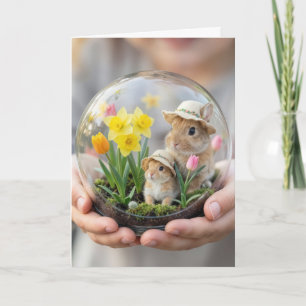 Tarjeta Conejos de Pascua en Terrario Sostenido por la Man