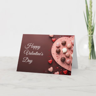 Tarjeta Corazones de chocolate rosa sobre fondo oscuro San
