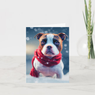 Tarjeta Cuidada y robusta cachorro en una bufanda roja de 