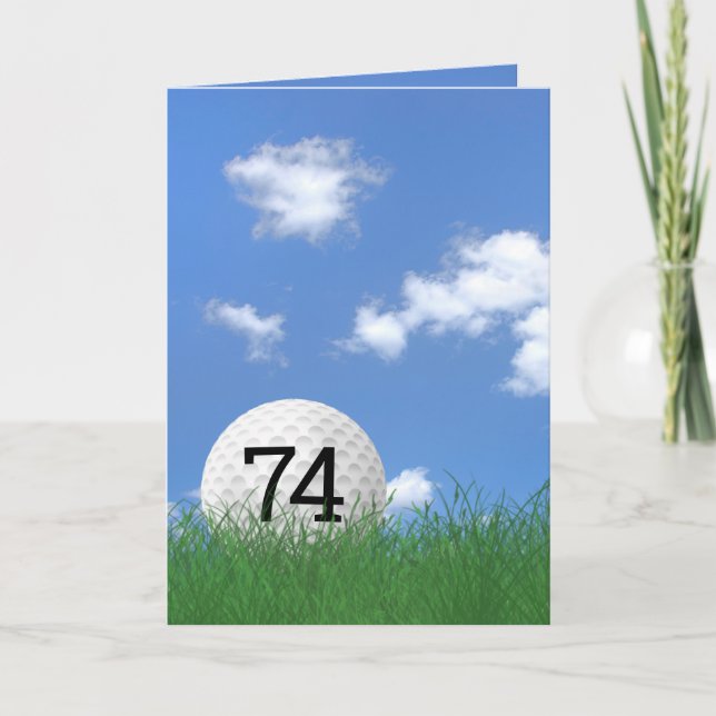 Tarjeta cumpleaños 74, pelota de golf en hierba (Anverso)