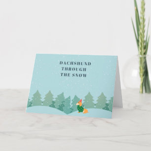 Tarjeta Dachshund a través de la nieve