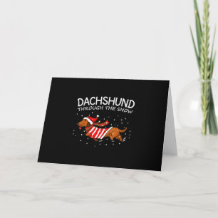 Tarjeta Dachshund a través de la nieve divertido perro Nav