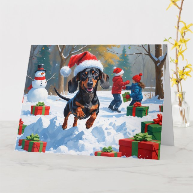Tarjeta Dachshund corre en nieve con Gorra Navidad (flor amarilla)