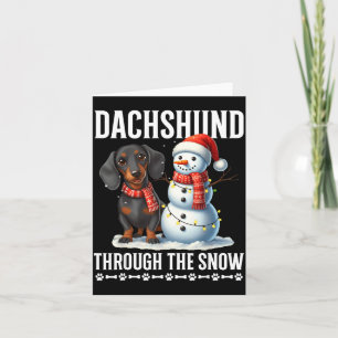 Tarjeta Dachshund feo Navidad a través de la nieve regalo