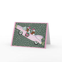 Dachshunds en Navidad en un convertible rosa