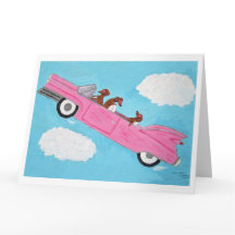 Dachshunds en un convertible rosa en el cielo