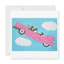 Dachshunds en un convertible rosa en el cielo
