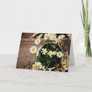Tarjeta Daisie rústico en un florero