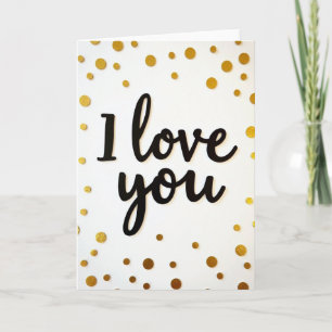 Tarjeta de acento dorado con la frase 'Te amo'