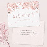 Tarjeta De Agradecimiento Arigato con Bonito de flores de cerezo japonés<br><div class="desc">Esta tarjeta de agradecimiento japonesa bonito presenta un delicado motivo de flor de cerezo en el frente con flores cayendo en el lado y debajo del texto además del dosel de flores arriba. Prestan un sutil sentido del equilibrio, en armonía con el espacio en blanco, acribillando suavemente el mensaje de...</div>