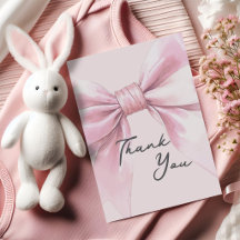 Bebé niña con lazo rosa