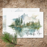Tarjeta De Agradecimiento Boda de acuarela Rustic Mountain Lake Scene<br><div class="desc">Escape a un refugio sereno de montaña con su tarjeta de agradecimiento boda. Este diseño exquisito muestra una impresionante pintura acuática de una majestuosa montaña, sus laderas cubiertas de pinos exuberantes, reflejando su belleza en las aguas cristalinas de abajo. Los tonos mullidos del bronceado, los verdes, el azul verde azulado...</div>