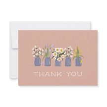 Carrito de flores vinca rosa en frasco de Mason a