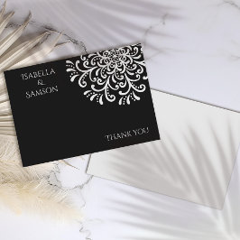 Tarjeta de agradecimiento con florituras en blanco