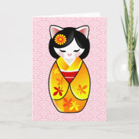 El gato afortunado japonés de Kokeshi Maneki Neko