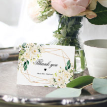 Flores blancas y marco dorado