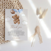 Oso de peluche, globos azules, primer cumpleaños