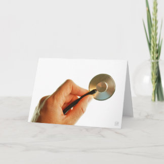 Tarjeta De Agradecimiento Stethoscoop in een hand voor een ziekenhuis sfeer.