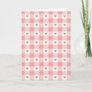Tarjeta de amor a cuadros con corazones rosados
