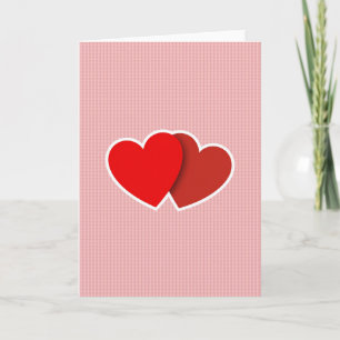 Tarjeta de amor de dos corazones abrazados