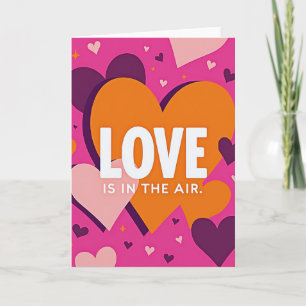Tarjeta de amor rosa en el aire