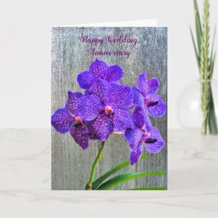 Tarjeta de aniversario boda con orquídeas púrpura