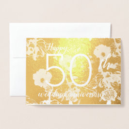Tarjeta de aniversario de bodas de oro con flores