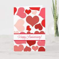 Tarjeta de aniversario feliz de corazones rojos