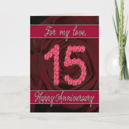 Tarjeta de aniversario número 15 con rosas y hojas