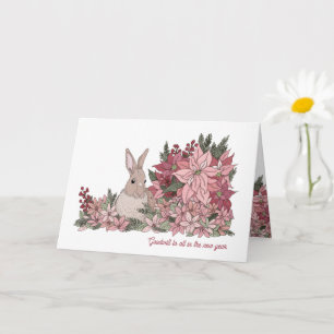 Tarjeta de Año Nuevo de conejo y flores rosadas